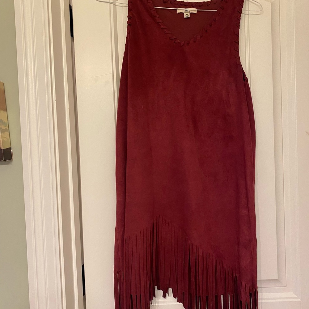 Women’s maroon suede dress.